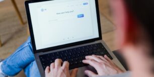 Person typing on a laptop using an AI chatbot assistant. Photographer: Getty Images Creative Labs