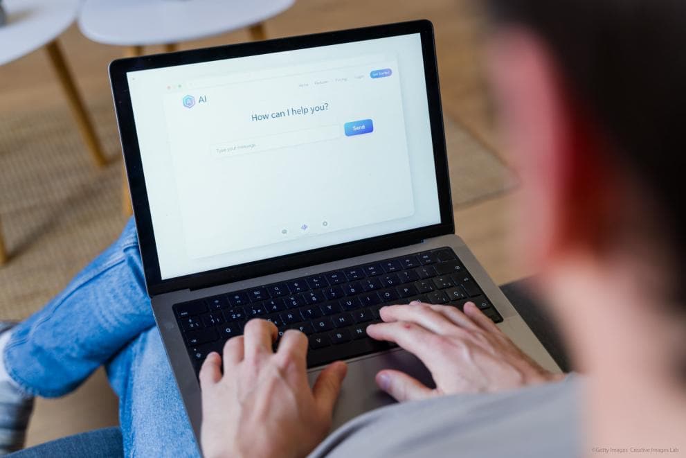 Person typing on a laptop using an AI chatbot assistant. Photographer: Getty Images Creative Labs